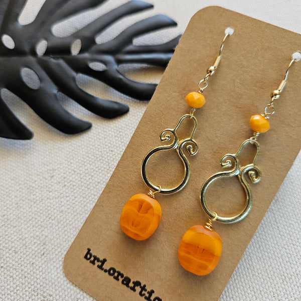Orange Sunburst Dangle Earrings
