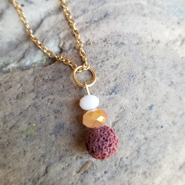 Golden Crystal and Brown Lava diffuser necklace