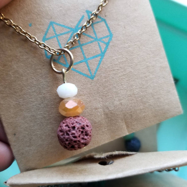 Golden Crystal and Brown Lava diffuser necklace